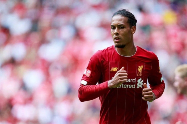 Saliba Draws Inspiration from Van Dijk's Leadership and Defensive Mastery
